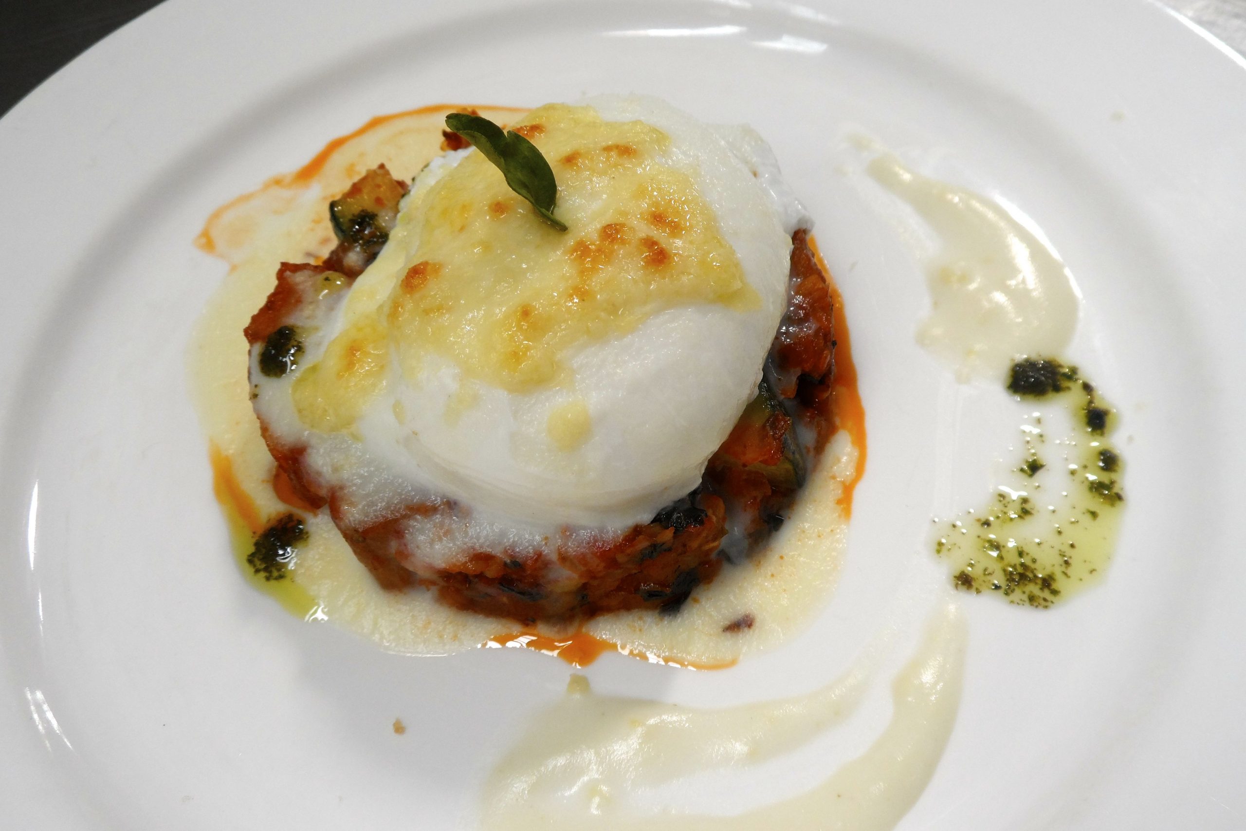 Poached on ratatouille with Mornay sauce2